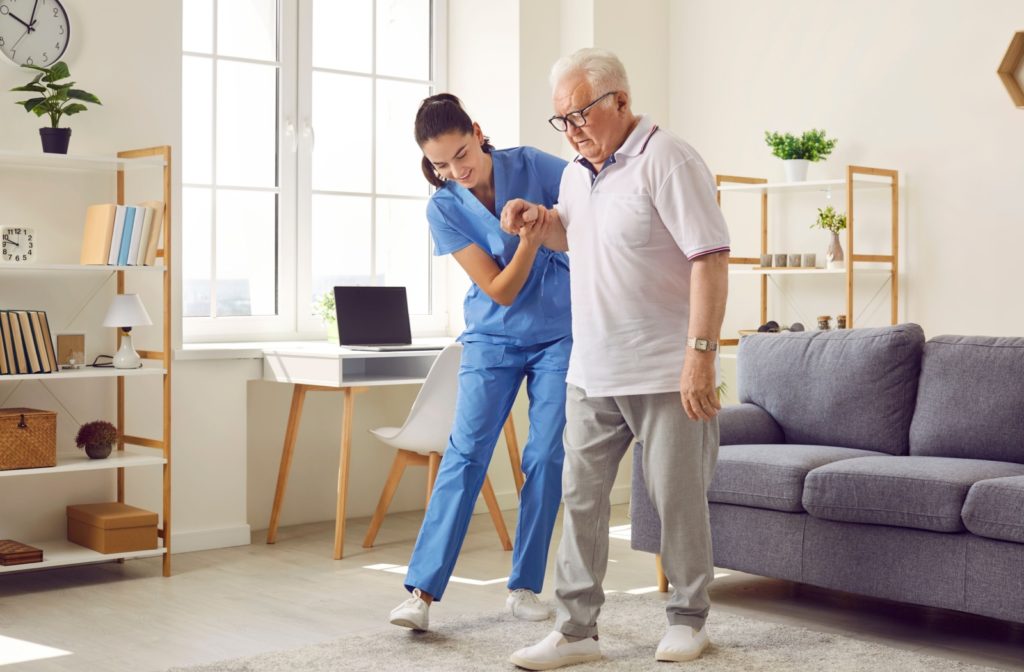 A nurse assisting a resident in a assisted living with their daily activities.