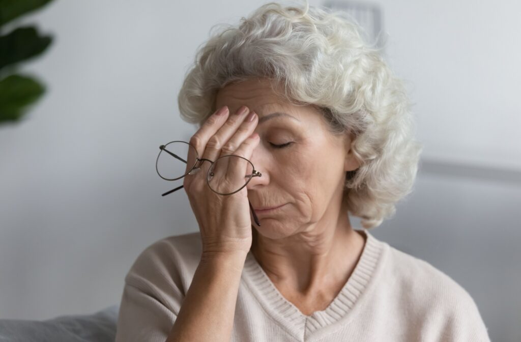 An older woman with a concerned expression.